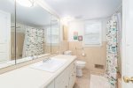 Full bathroom with shower tub combo 